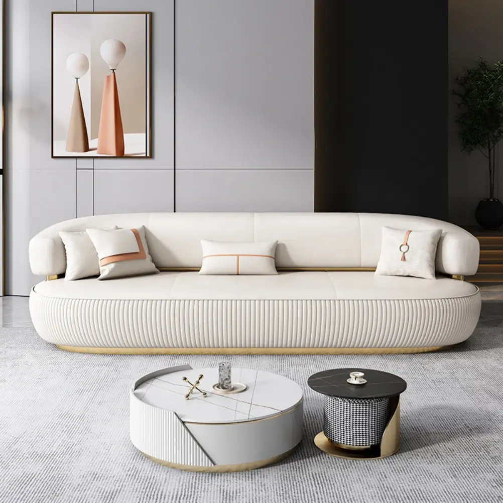 Cream Sofa with Pleated Skirt Base and Gold Metallic Trim